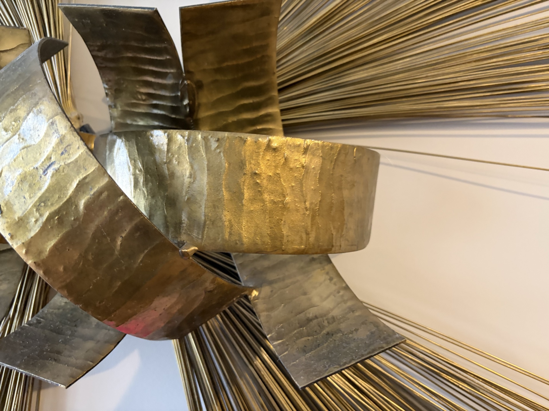 Gold-toned metal sunburst wall sculpture - image 4 of 5