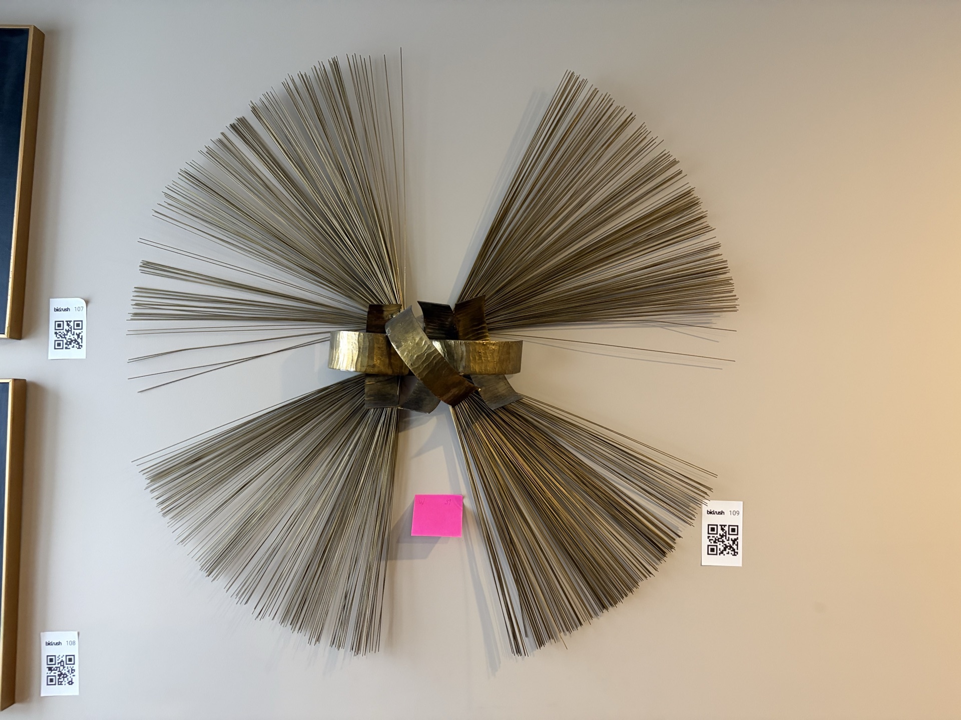 Gold-toned metal sunburst wall sculpture - image 2 of 5