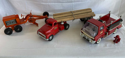 Tonka Toys: red logging truck with log trailer and red fire engine with accessories - Image 1 of 14