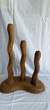 Wooden decorative items: multi-branch candle holder, miniature rocking chair, and heart-shaped peg rack - thumbnail 2 of 7