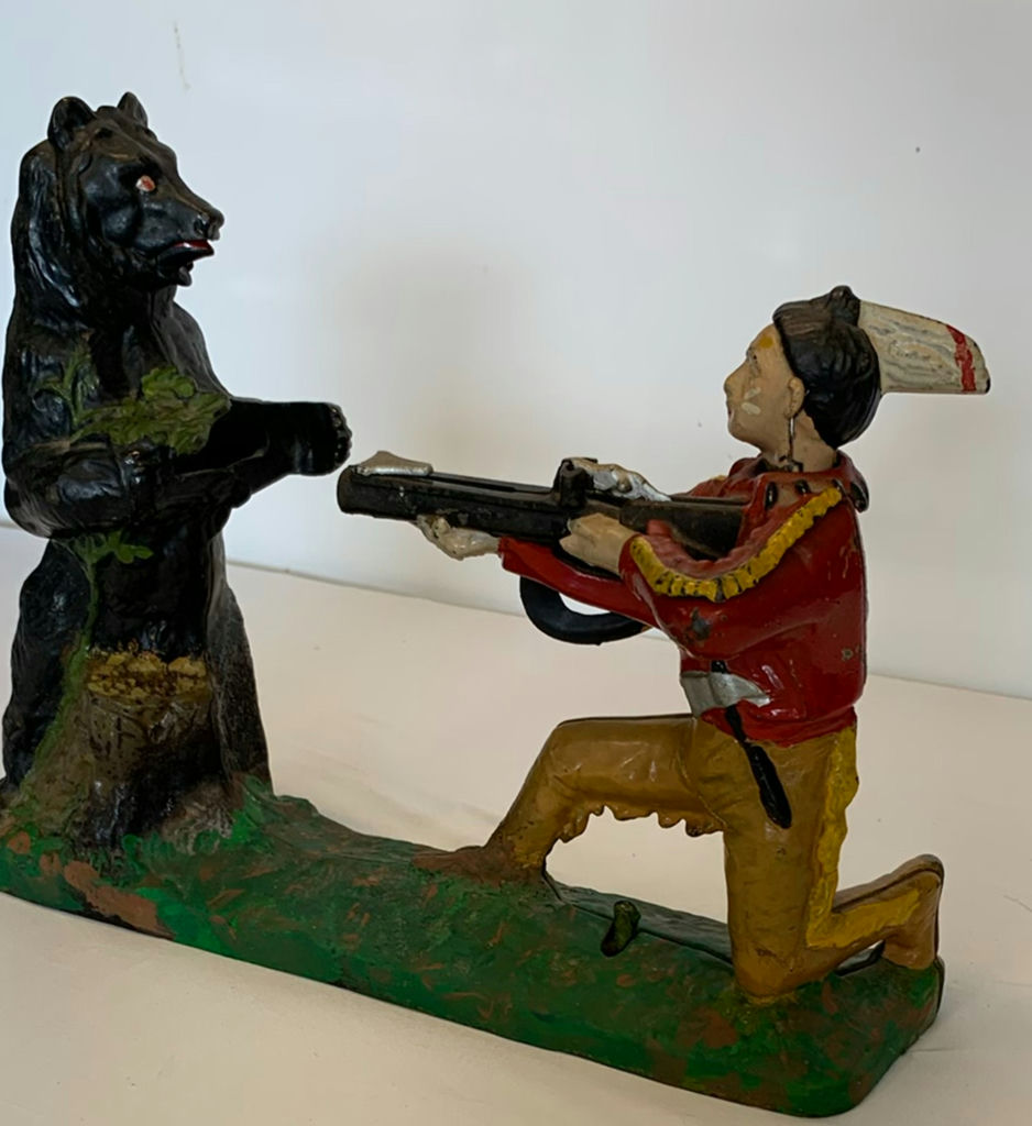 Antique Painted Cast Iron Piggy Bank of Native American hunting a Bear - image 1 of 7