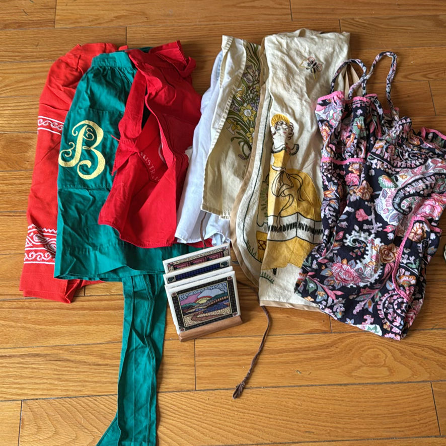 Various Vintage Aprons And Coaster Set - image 1 of 6