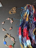Assorted Jewelry Collection with Beaded Bracelets, Pendants, and Watch Band - thumbnail 5 of 7