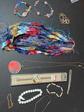 Assorted Jewelry Collection with Beaded Bracelets, Pendants, and Watch Band - thumbnail 1 of 7
