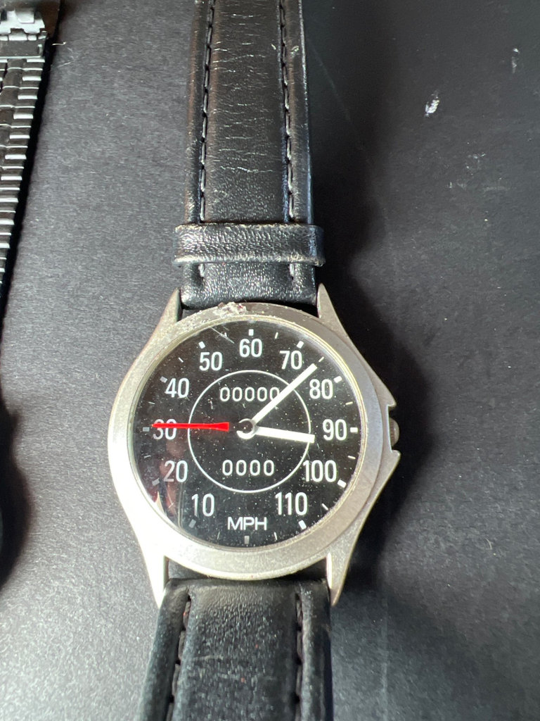 Route 66 Sapulpa memorabilia and a speedometer and Porsche wristwatches - image 5 of 7