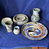 Collection of Marbled Pottery Bowls, Plate, Pitcher, and Vases - thumbnail 1 of 23
