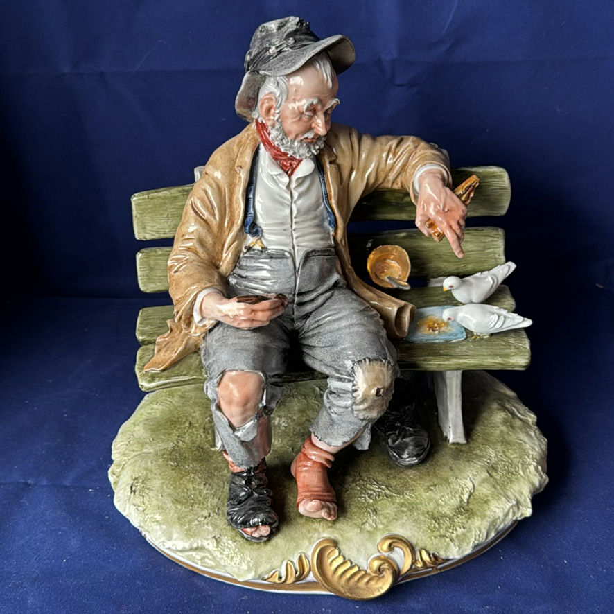 Capodimonte “Tramp On A Bench” - image 1 of 7