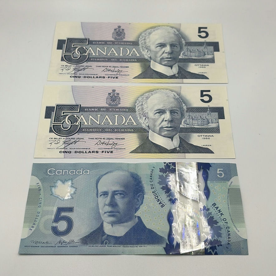 $5 Canadian Bills 1986 And 2013 - image 1 of 8