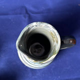 Collection of Marbled Pottery Bowls, Plate, Pitcher, and Vases - thumbnail 11 of 23