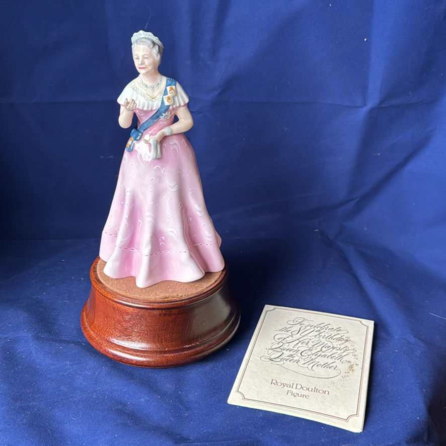 Royal Doulton Queen Elizabeth II Figurine On Wooden Base - image 1 of 9