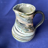 Collection of Marbled Pottery Bowls, Plate, Pitcher, and Vases - thumbnail 10 of 23
