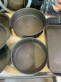 Assorted bakeware set including loaf pans, cake pans, muffin pan and baking sheets - thumbnail 3 of 6