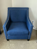 Blue fabric armchair featuring nailhead trim and matching ottoman. - thumbnail 2 of 5