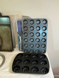 Assorted bakeware set including loaf pans, cake pans, muffin pan and baking sheets - thumbnail 6 of 6