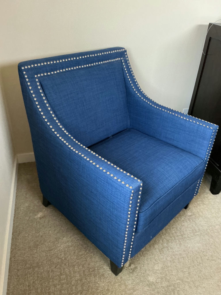 Blue fabric armchair featuring nailhead trim and matching ottoman. - image 3 of 5