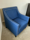 Blue fabric armchair featuring nailhead trim and matching ottoman. - thumbnail 3 of 5