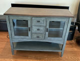 Media cabinet with glass doors and central drawers - thumbnail 1 of 5