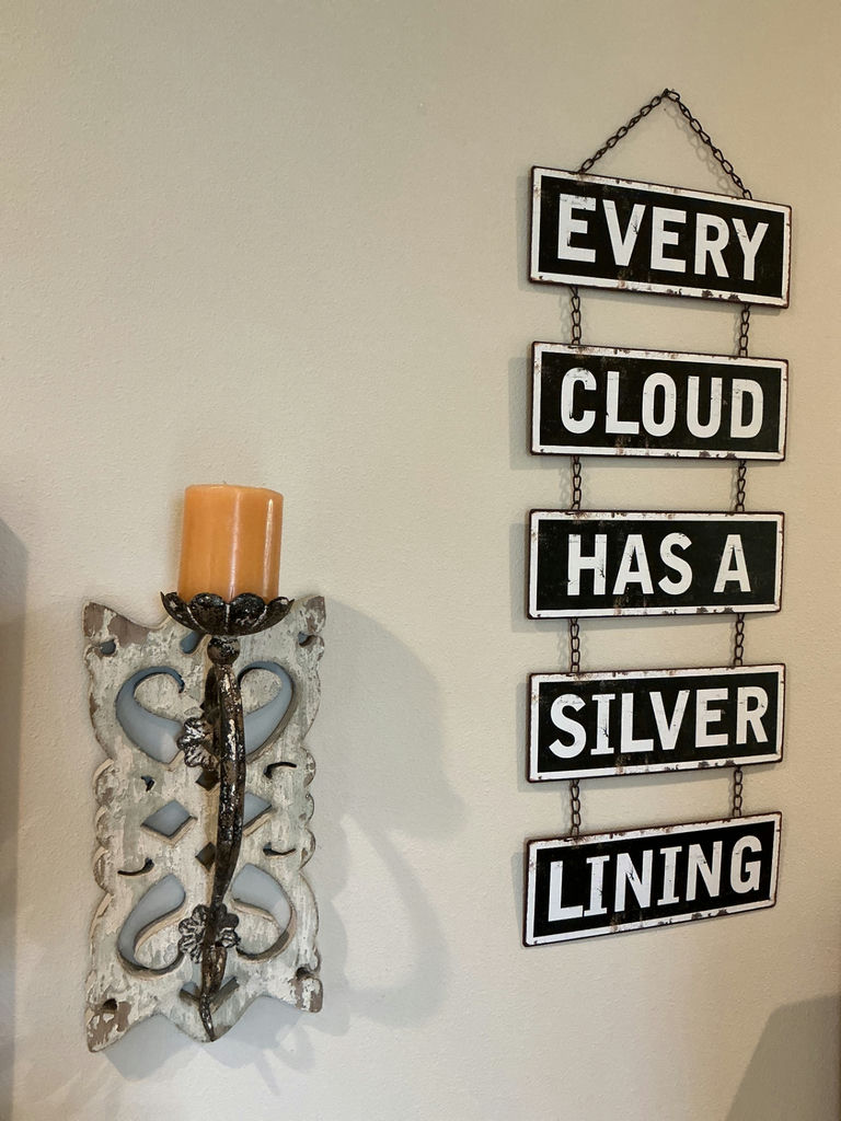Five-panel hanging sign reading 'EVERY CLOUD HAS A SILVER LINING' and a decorative metal wall sconce with candle - image 2 of 4