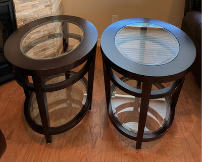 Pair of round  wood and glass-top end tables - Image 1 of 3
