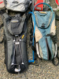 Cycling gear set with helmets, hydration packs, and high-visibility vests - thumbnail 2 of 7