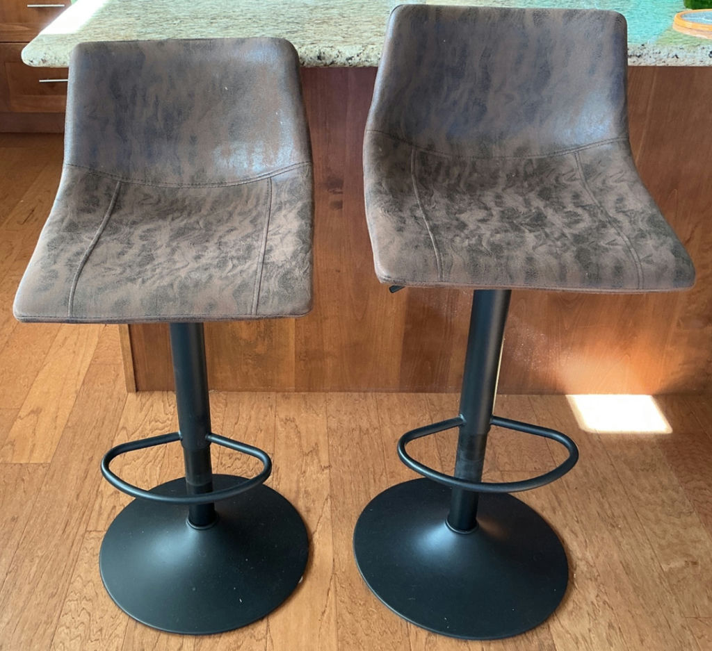 Pair of brown Faux suede swiveling bar stools. - image 1 of 5