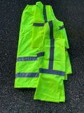Cycling gear set with helmets, hydration packs, and high-visibility vests - thumbnail 7 of 7