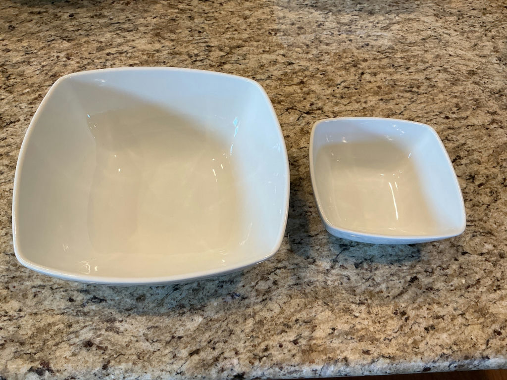 Four white ceramic serving bowls in varying sizes. - image 2 of 4