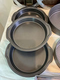 Assorted bakeware set including loaf pans, cake pans, muffin pan and baking sheets - thumbnail 2 of 6