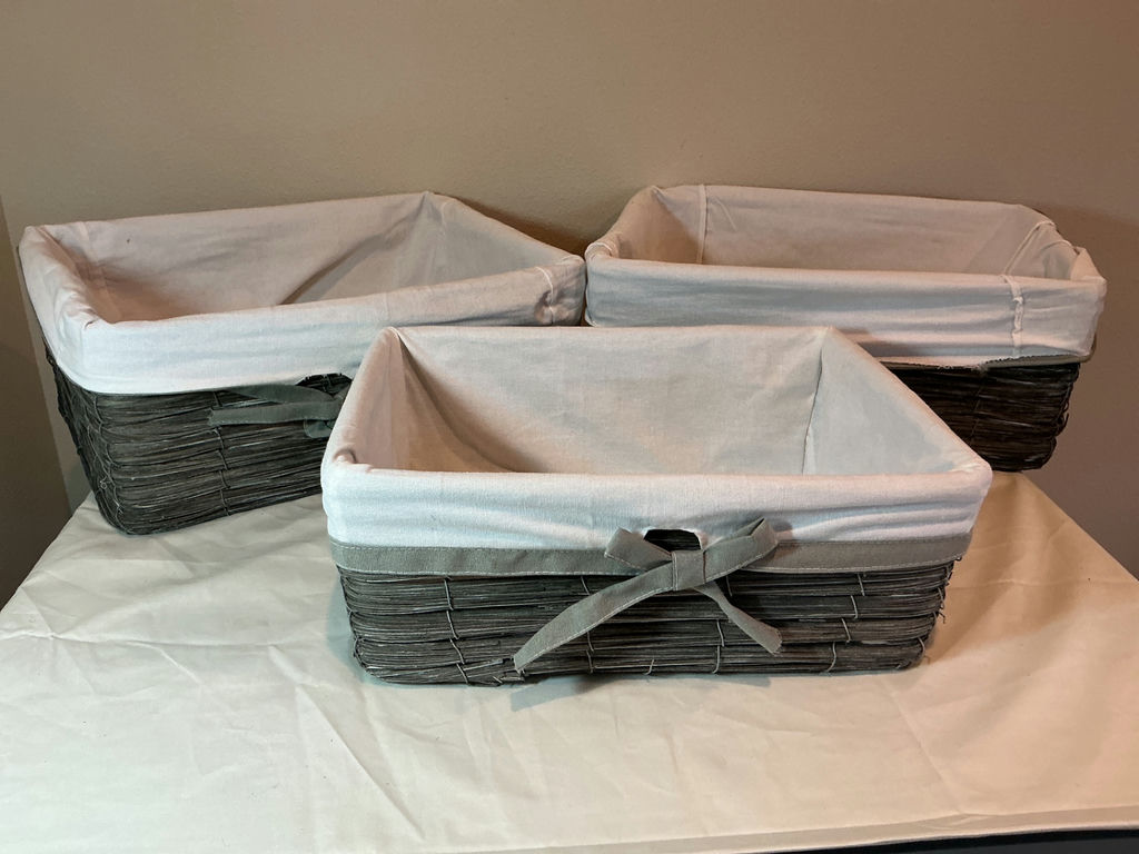 Rectangular wicker storage baskets with fabric liners. - image 1 of 3