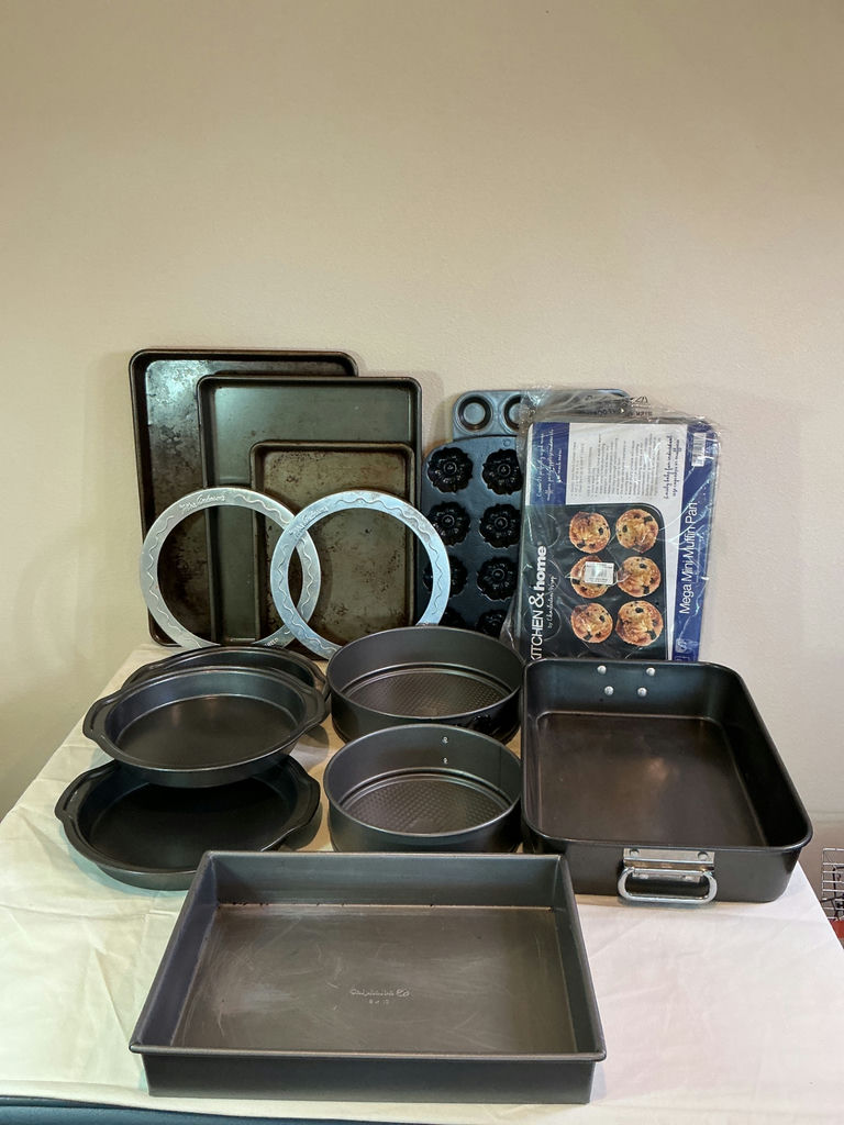 Assorted bakeware set including loaf pans, cake pans, muffin pan and baking sheets - image 1 of 6