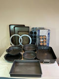 Assorted bakeware set including loaf pans, cake pans, muffin pan and baking sheets - thumbnail 1 of 6