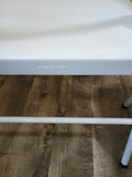 Two white metal folding chairs - thumbnail 3 of 3