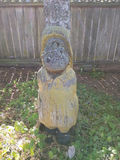Weathered yellow wooden statue yard art - thumbnail 1 of 3