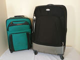 Three pieces of luggage: two rolling suitcases and a backpack - thumbnail 1 of 8
