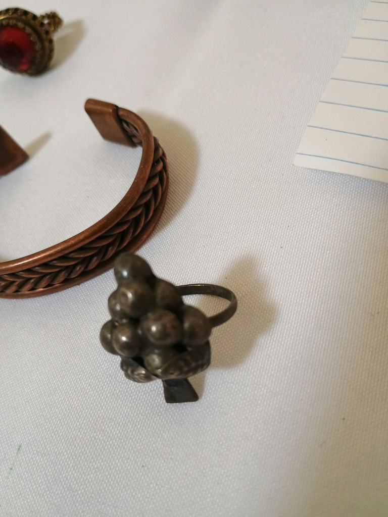 Copper braided bracelet, red cabochon ring, bronze bird pin, and grape cluster ring - image 4 of 6