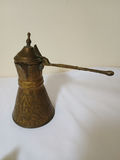 Brass incense censer, brass oil can, glass star sculpture, and jade Buddha figurine - thumbnail 2 of 6