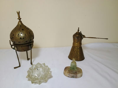 Brass incense censer, brass oil can, glass star sculpture, and jade Buddha figurine - Image 1 of 6