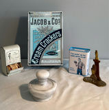 Vintage marble pestle and mortar, brass hands candle holder, match dispenser, and cracker packaging - thumbnail 1 of 9