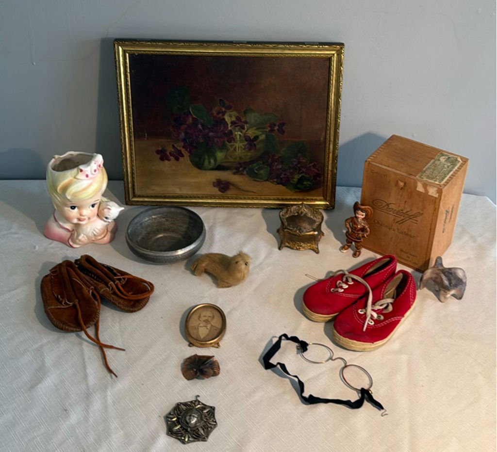 Framed floral painting with assorted vintage trinkets - image 1 of 6