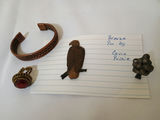Copper braided bracelet, red cabochon ring, bronze bird pin, and grape cluster ring - thumbnail 1 of 6