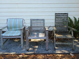 Three weathered wooden patio chairs with striped cushion - thumbnail 1 of 4