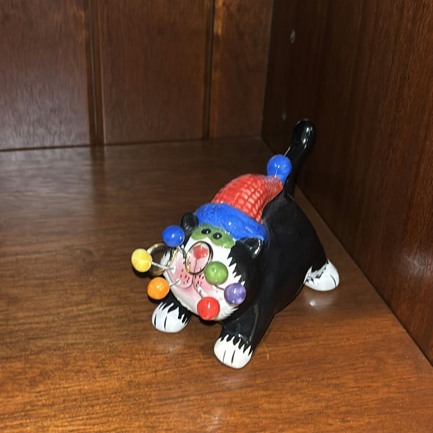 Books, Elephant Figurines, and Speaker on Wooden Bookshelf - image 10 of 17