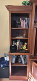 Books, Elephant Figurines, and Speaker on Wooden Bookshelf - thumbnail 1 of 17