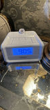 Mirrored Nightstand with Table Lamp, Clocks, and Decorative Globe - thumbnail 2 of 8