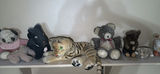 Collection of Stuffed Animals and Goose Figurine - thumbnail 1 of 8
