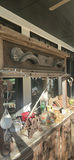Rustic Wooden Bar Cabinet with Decorative Items - thumbnail 5 of 7