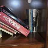 Wooden Bookshelf with Books and Decorative Items - thumbnail 8 of 15