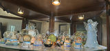 Collection of Travel Souvenir Snow Globes and Glass Angel Figurines - thumbnail 1 of 8