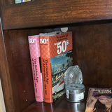 Wooden Bookshelf with Books and Decorative Items - thumbnail 9 of 15
