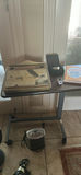 Portable Heater, Desk Fan, Hair Dryer, Rolling Table, and Assorted Household Items - thumbnail 1 of 6